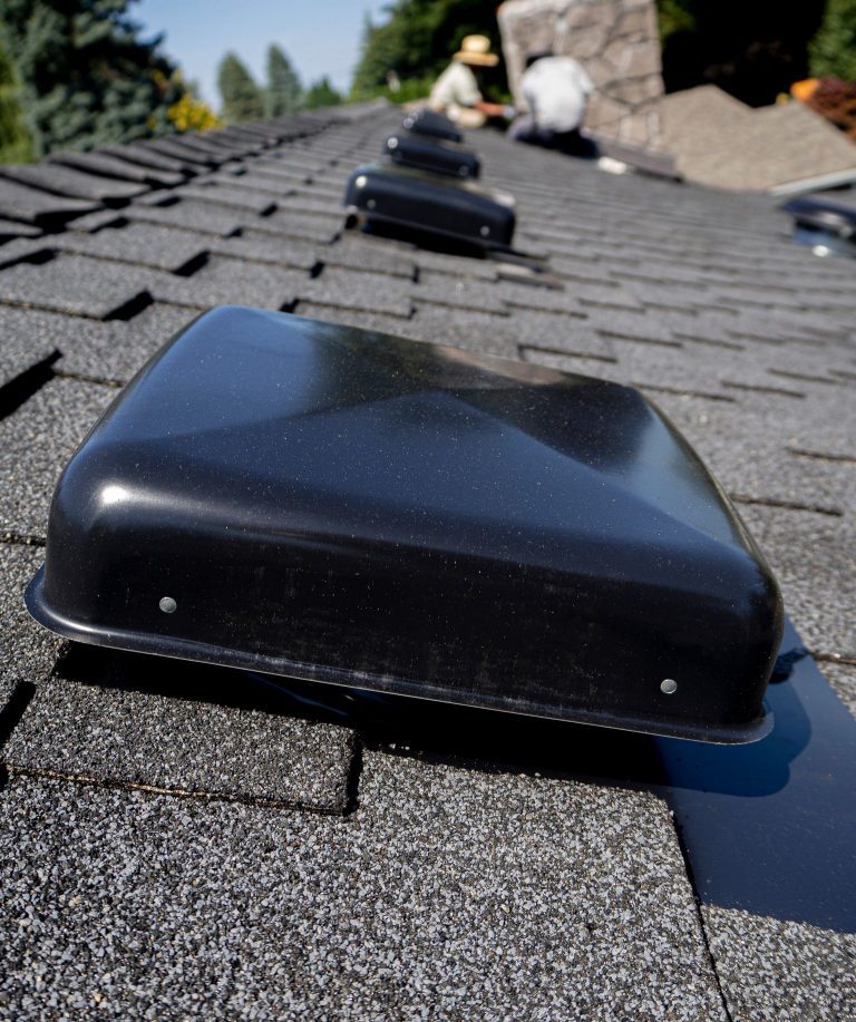 A closeup view of vents on the roof of a home.
