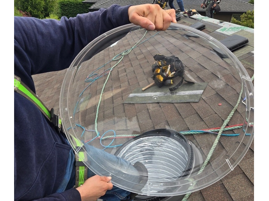 Holding SunTunnel To Show Size