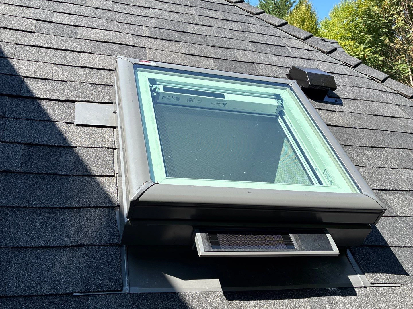 Solar skylight on new roof