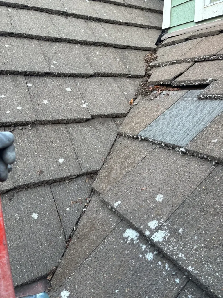 Tile Roof Valley With Debris Buildup Causing Leak in Vancouver, WA