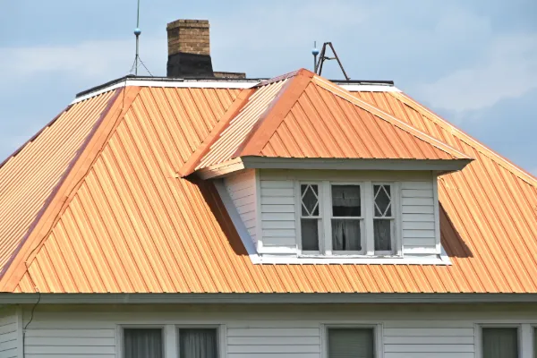 Copper metal roofing on a residential home.