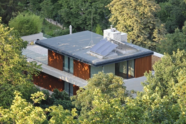 Flat membrane roof on a modern residential home